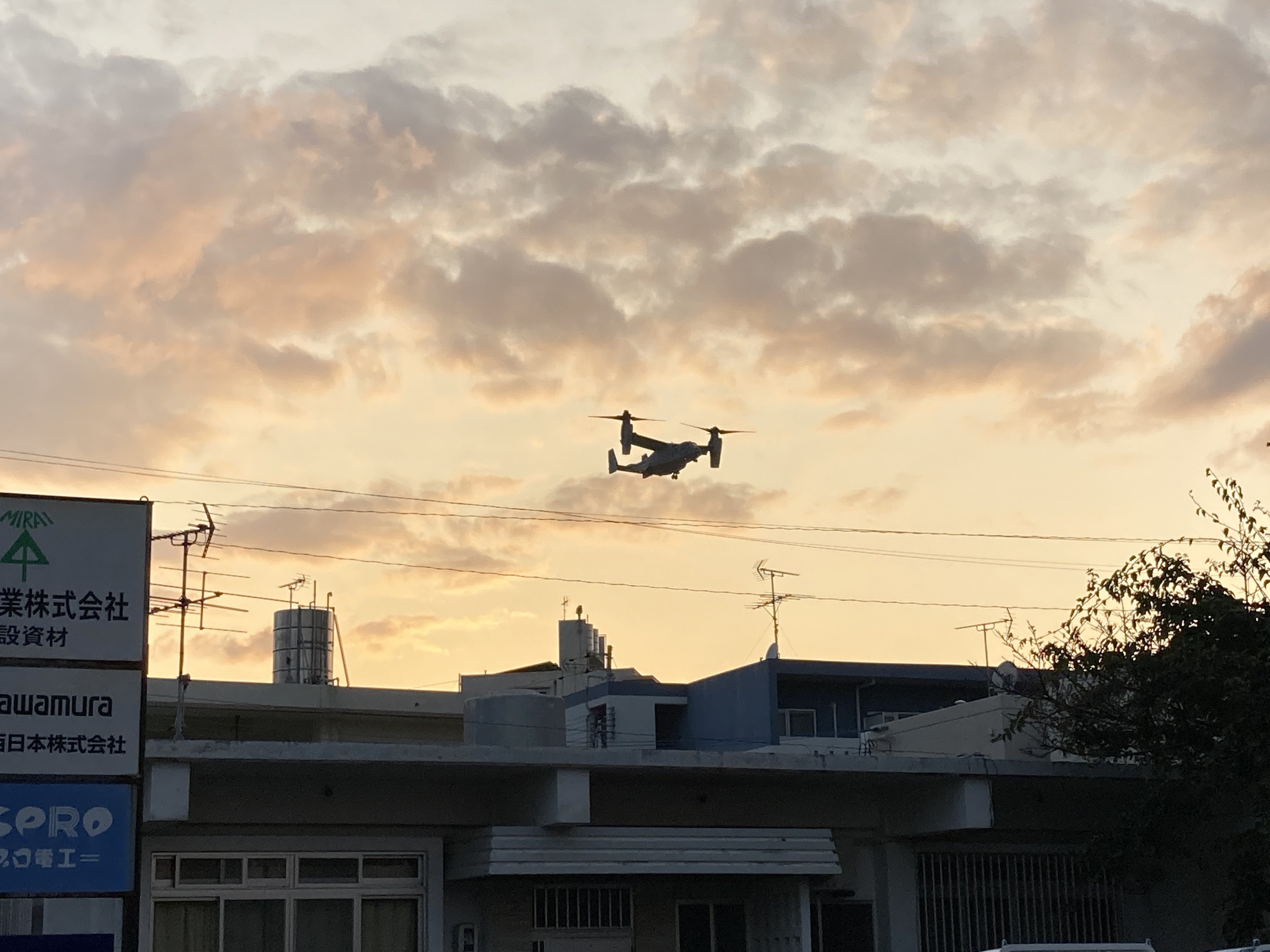 drone flying over buildings